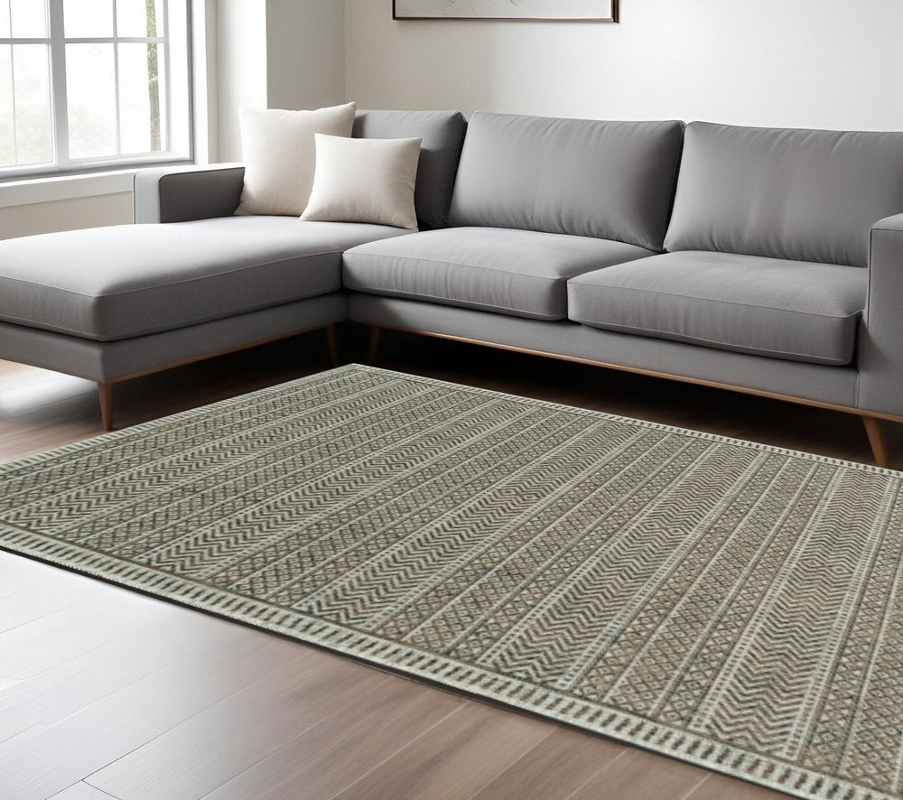 8' X 11' Brown And Ivory Geometric Area Rug
