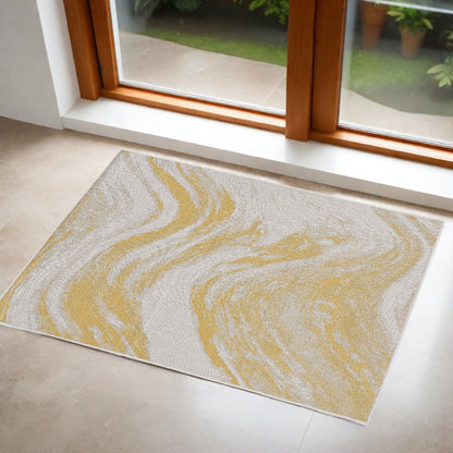 8' X 11' Ivory And Gold Abstract Area Rug