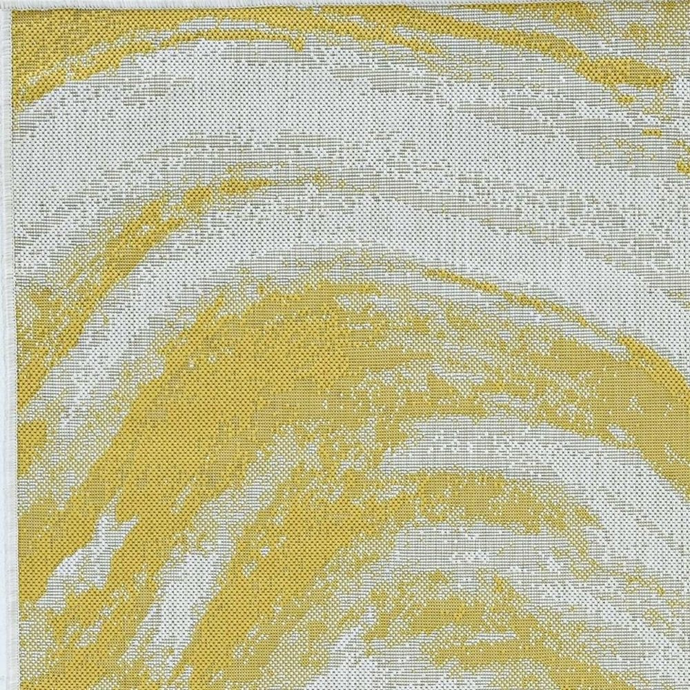 8' X 11' Ivory And Gold Abstract Area Rug