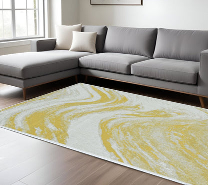8' X 11' Ivory And Gold Abstract Area Rug