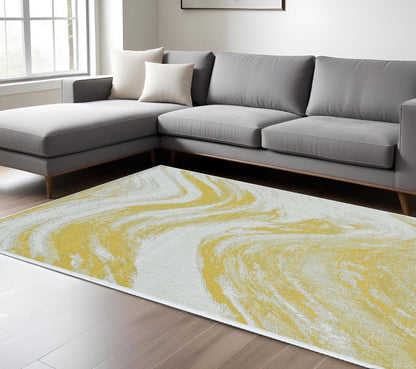 3' X 5' Gold and Ivory Abstract Area Rug