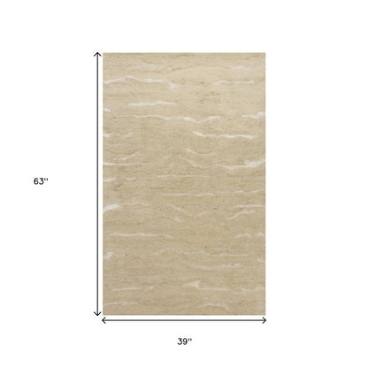 5' X 7' Beige And Ivory Abstract Hand Tufted Area Rug
