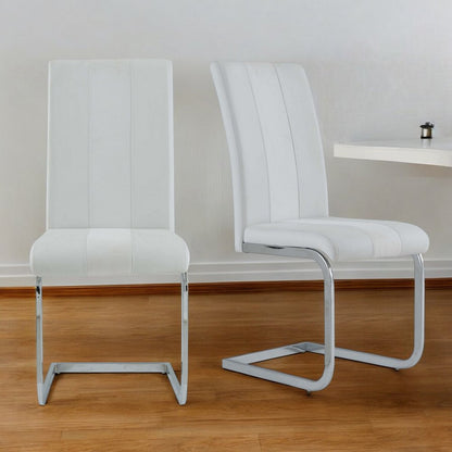 Set of Four White and Silver Upholstered Faux Leather Dining Side Chairs