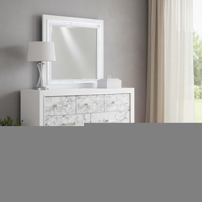 Modern White Dresser With 7 Faux Marble Detailed Front Drawer.