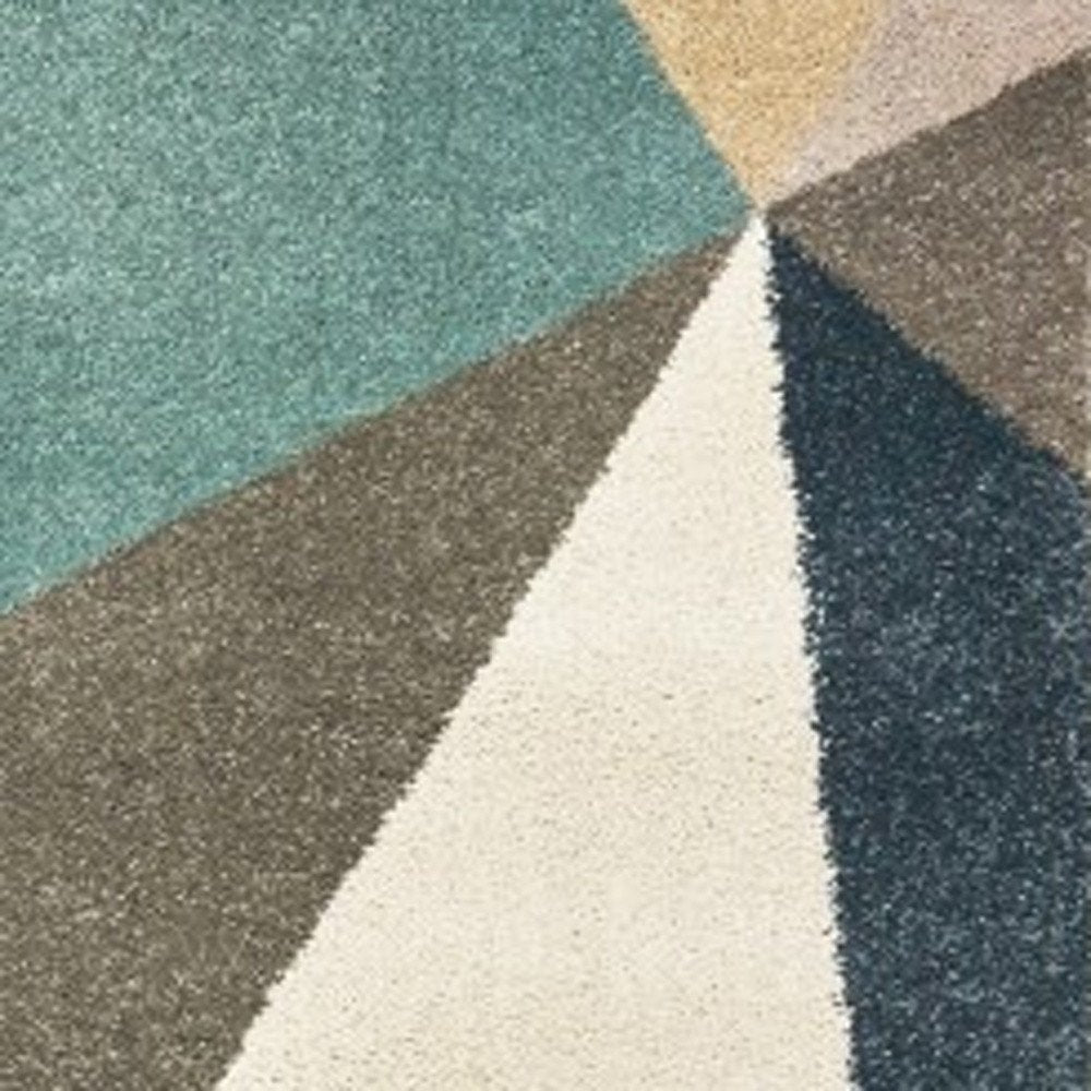 7' X 10' Blue Green And Beige Abstract Geometric Area Rug
