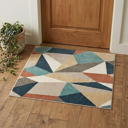 7' X 10' Blue Green And Beige Abstract Geometric Area Rug