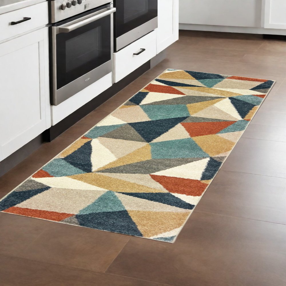 7' X 10' Blue Green And Beige Abstract Geometric Area Rug