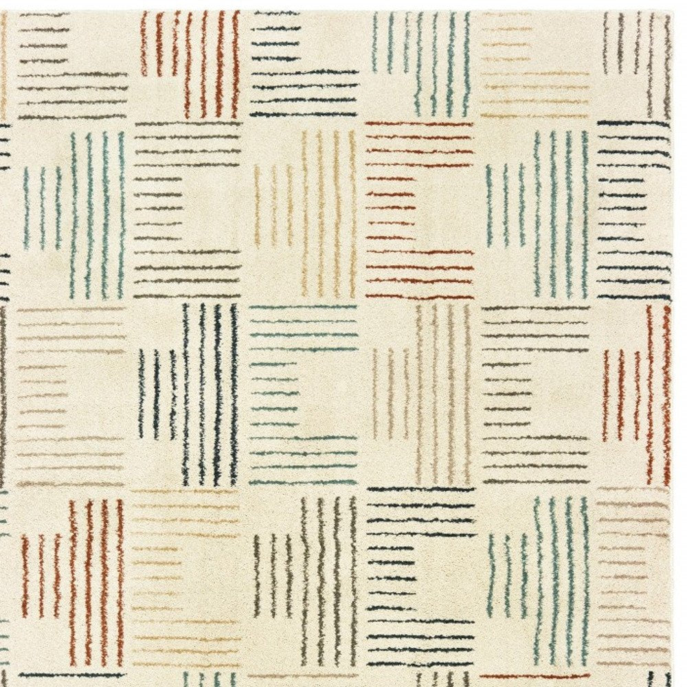 6' X 9' Ivory Blue And Red Geometric Area Rug