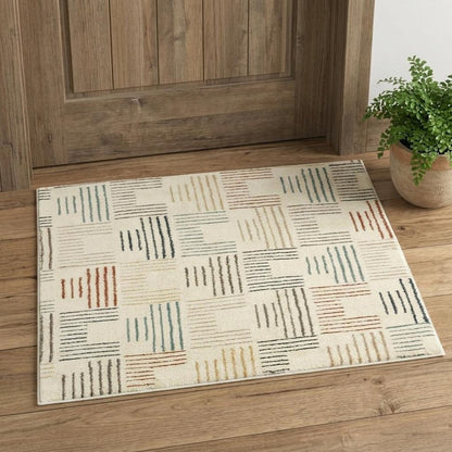 6' X 9' Ivory Blue And Red Geometric Area Rug