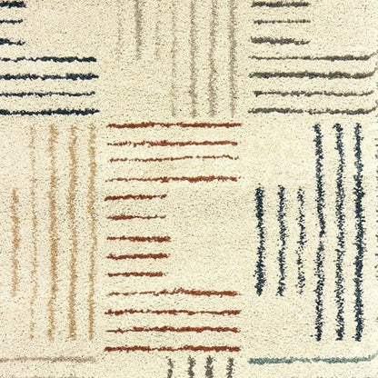 6' X 9' Ivory Blue And Red Geometric Area Rug