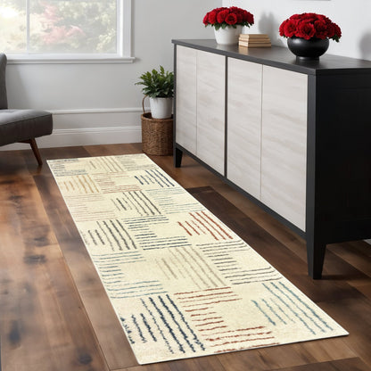 6' X 9' Ivory Blue And Red Geometric Area Rug