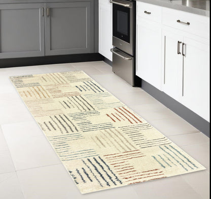 6' X 9' Ivory Multi Neutral Tone Scratch Indoor Area Rug