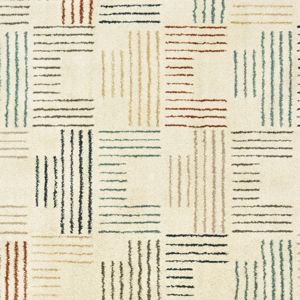 6' X 9' Ivory Blue And Red Geometric Area Rug