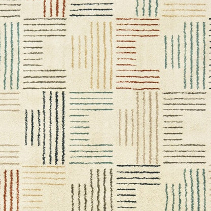 6' X 9' Ivory Blue And Red Geometric Area Rug