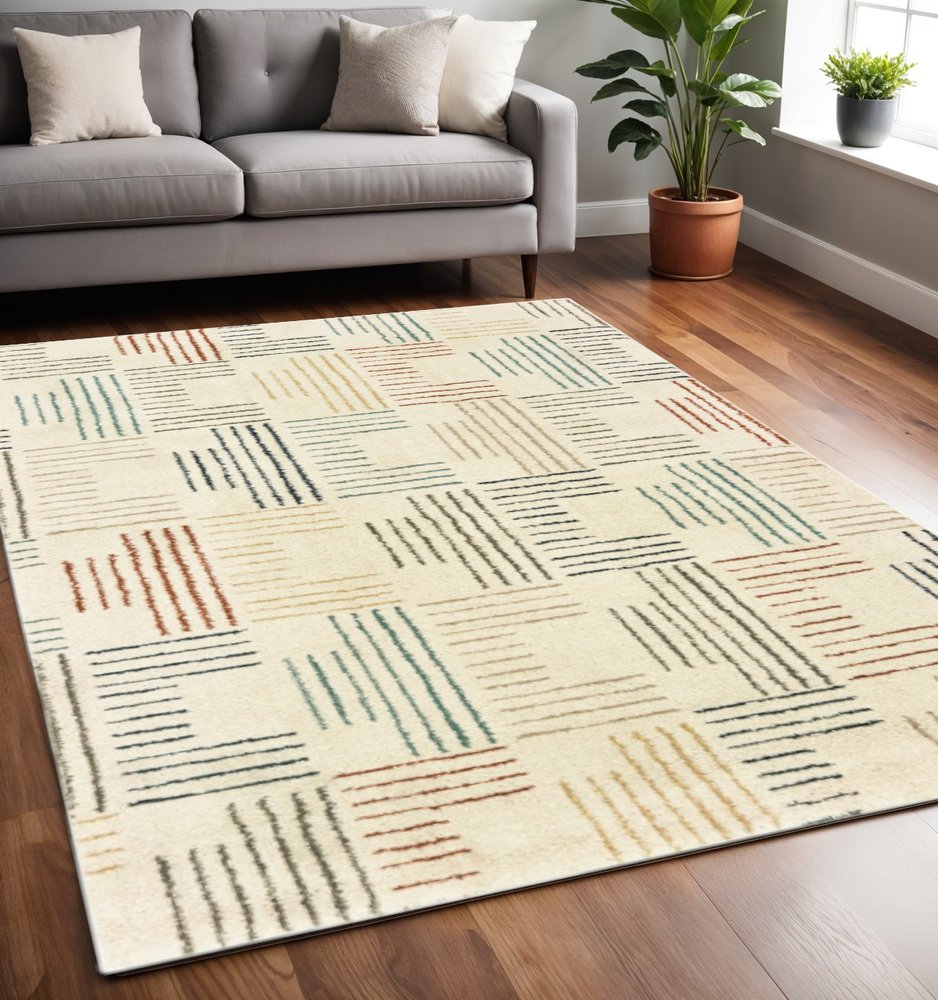 6' X 9' Ivory Blue And Red Geometric Area Rug