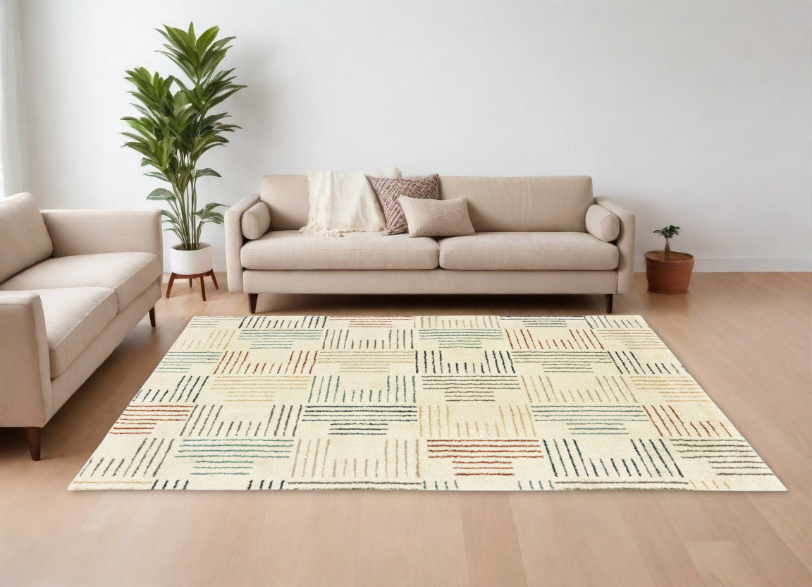 6' X 9' Ivory Multi Neutral Tone Scratch Indoor Area Rug