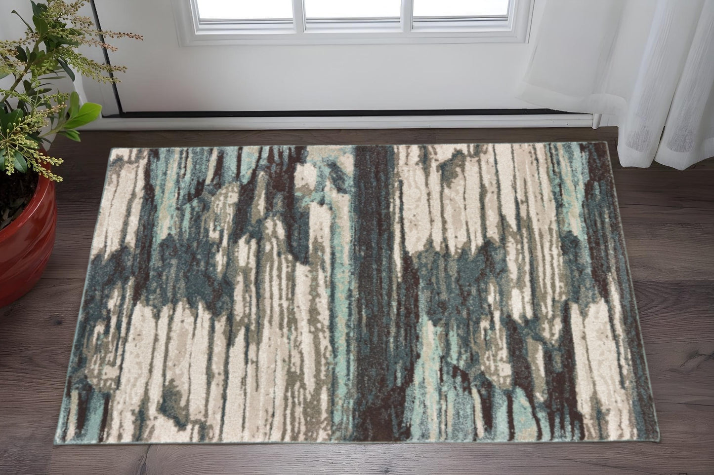 4' X 6' Ivory Blue And Gray Abstract Area Rug