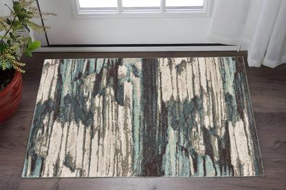 4' X 6' Ivory Blue And Gray Abstract Area Rug
