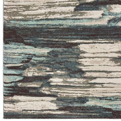 6' X 9' Ivory Blue And Gray Abstract Area Rug