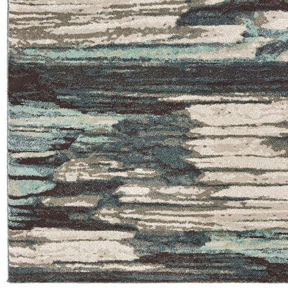 7' X 10' Ivory Blue And Gray Abstract Area Rug