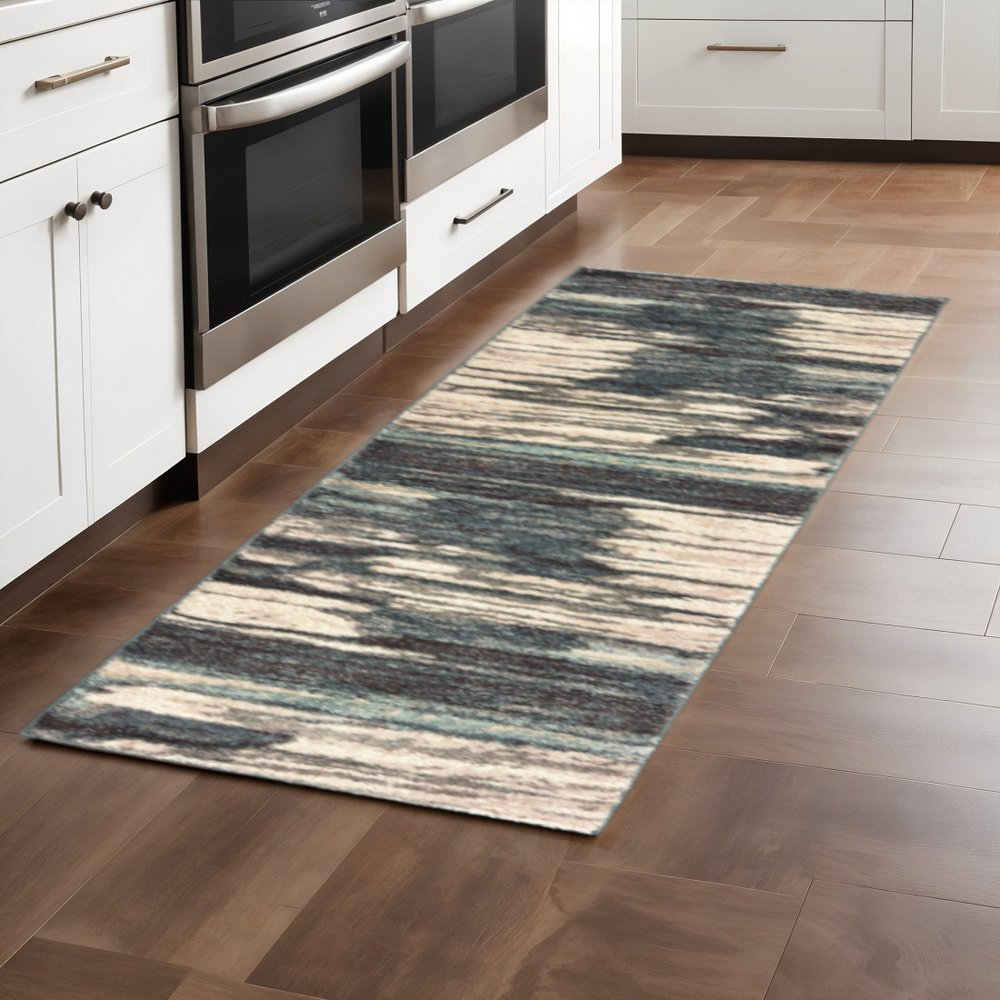 7' X 10' Ivory Blue And Gray Abstract Area Rug