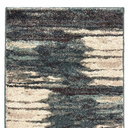 6' X 9' Ivory Blue And Gray Abstract Area Rug