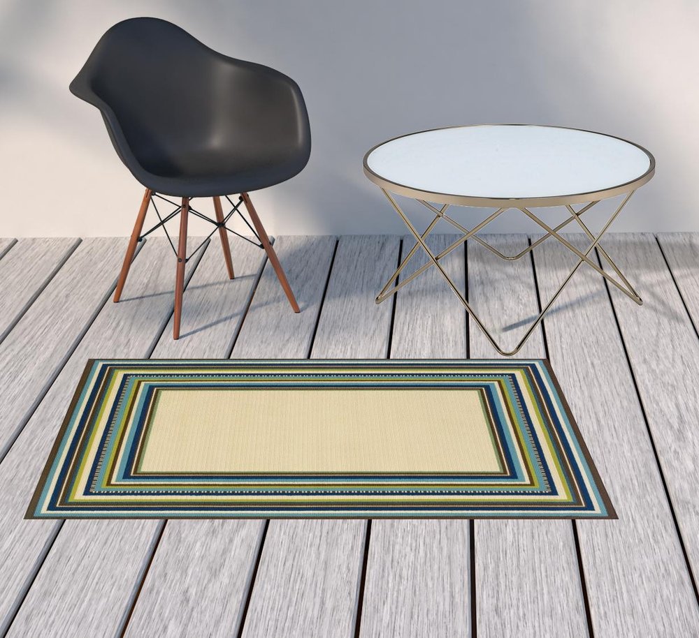 8' X 13' Ivory And Blue Striped Indoor Outdoor Area Rug