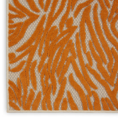 3' X 4' Orange And Ivory Abstract Indoor Outdoor Area Rug