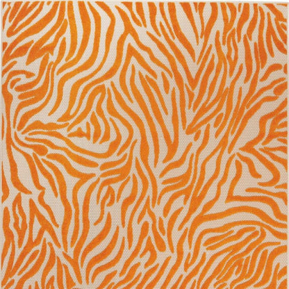 3' X 4' Orange And Ivory Abstract Indoor Outdoor Area Rug