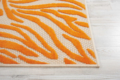 3' X 4' Orange And Ivory Abstract Indoor Outdoor Area Rug