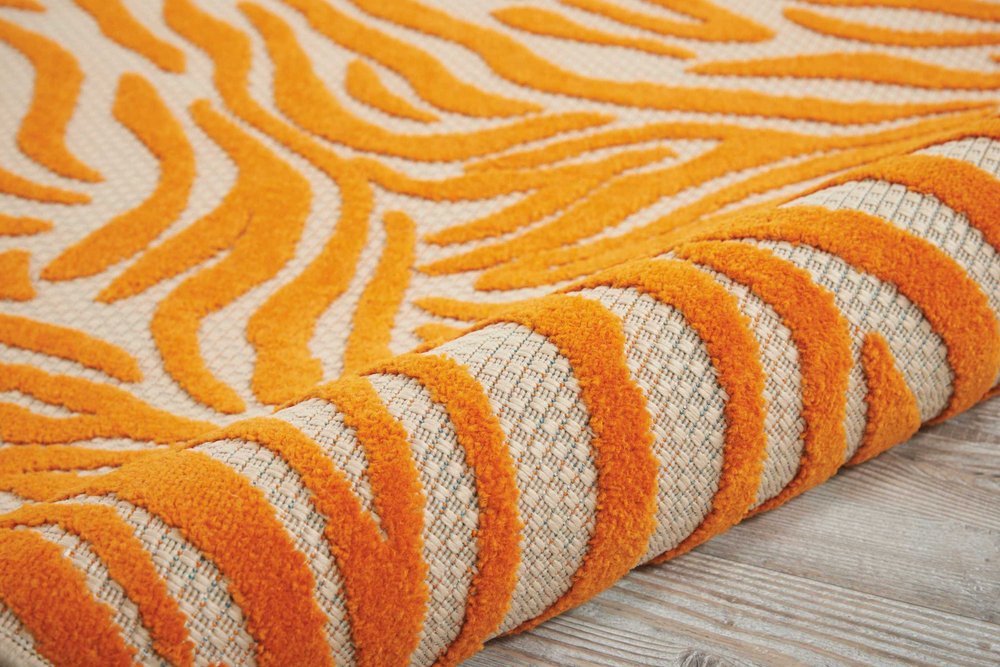 3' X 4' Orange And Ivory Abstract Indoor Outdoor Area Rug