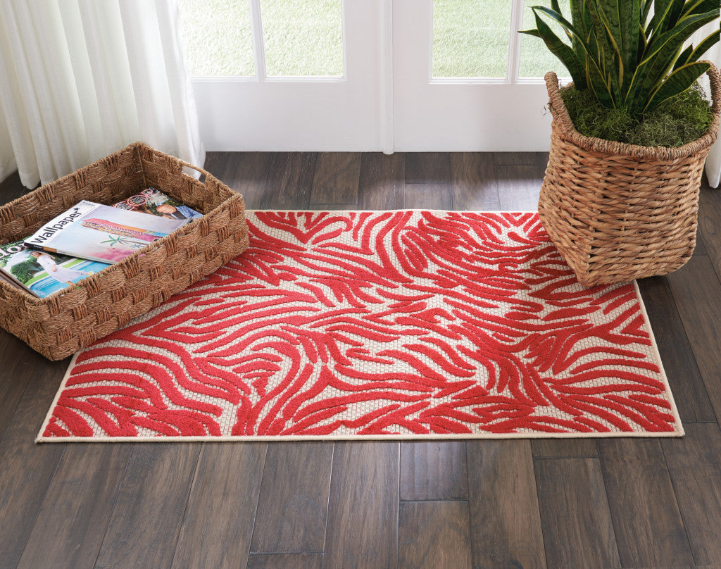 3' X 4' Orange And Ivory Abstract Indoor Outdoor Area Rug