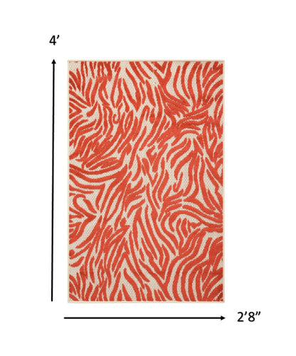 3' X 4' Orange And Ivory Abstract Indoor Outdoor Area Rug