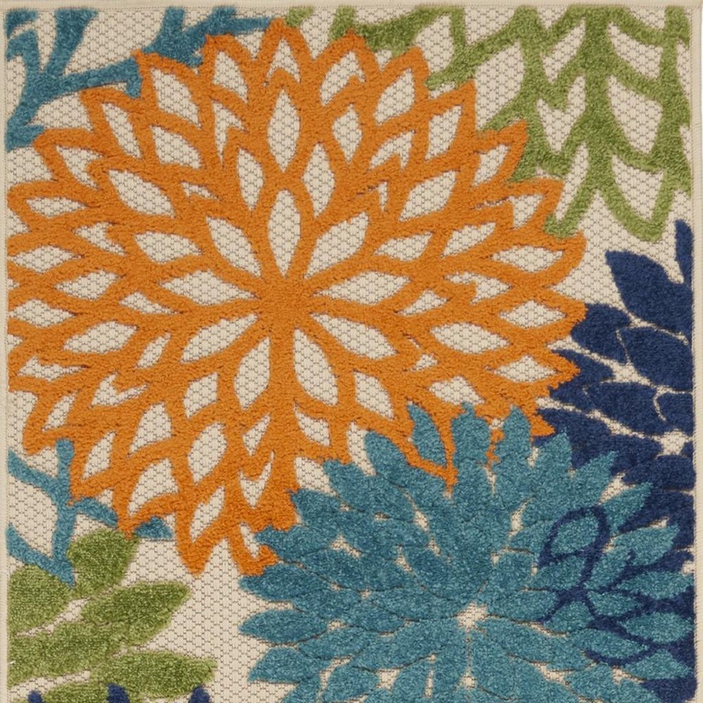 7' X 10' Ivory And Blue Floral Indoor Outdoor Area Rug