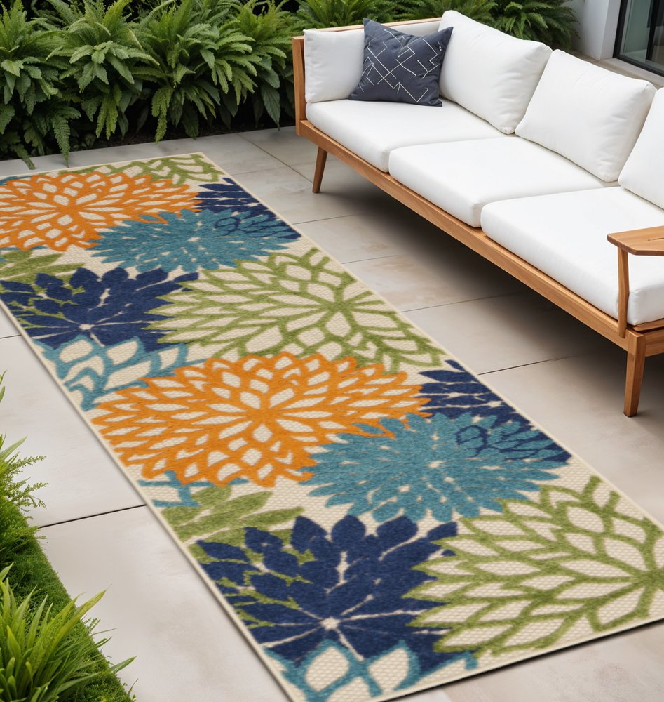 7' X 10' Ivory And Blue Floral Indoor Outdoor Area Rug
