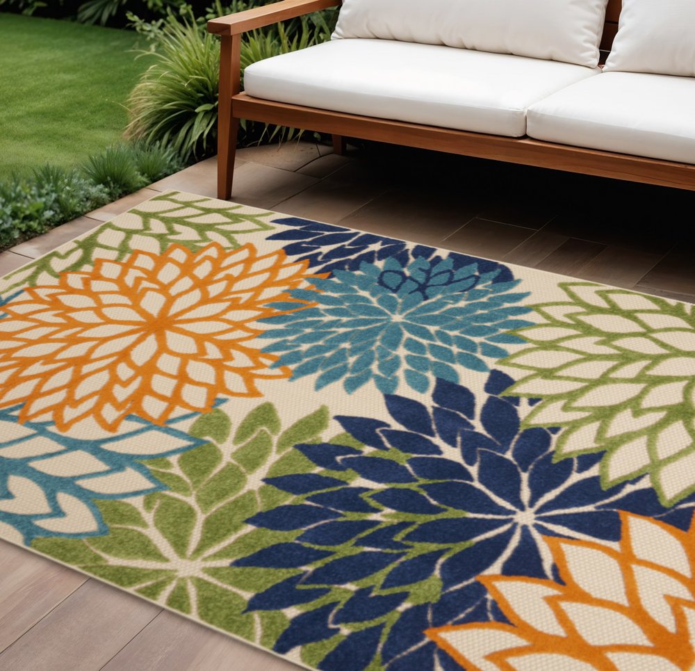 7' X 10' Ivory And Blue Floral Indoor Outdoor Area Rug