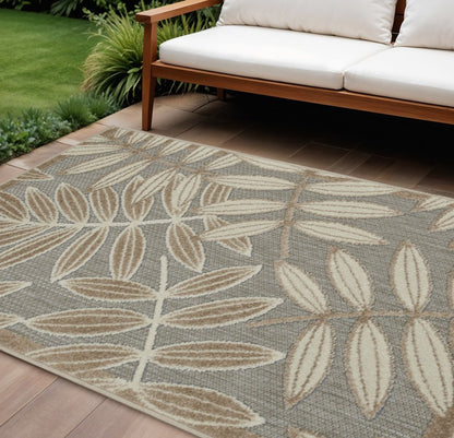 8' X 11' Beige Gray And Ivory Botanical Leaves Indoor Outdoor Area Rug