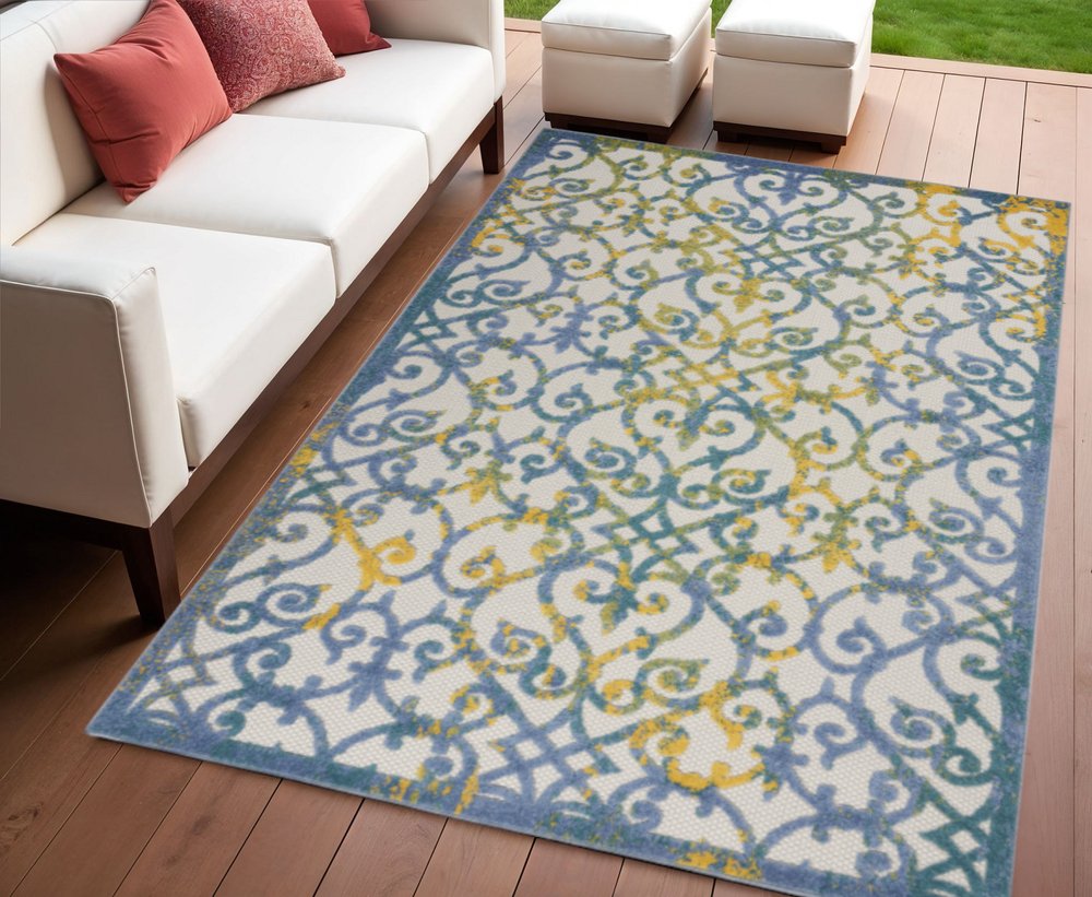 5' X 8' Ivory And Blue Indoor Outdoor Area Rug