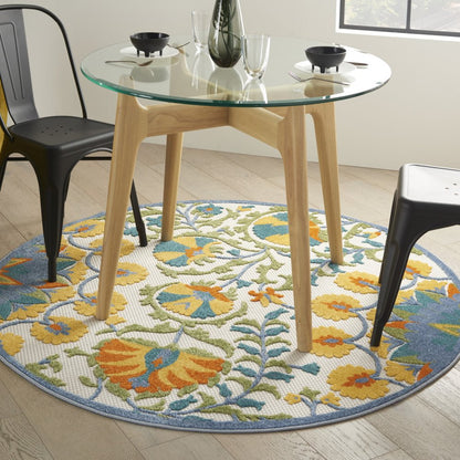 5' X 8' Ivory And Blue Floral Indoor Outdoor Area Rug