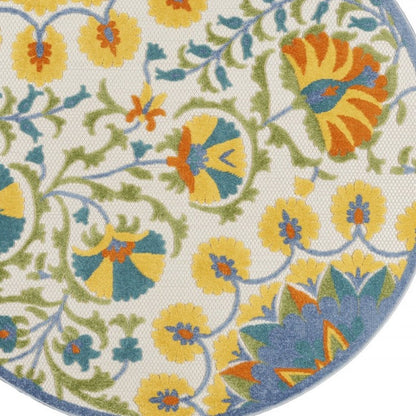5' X 8' Ivory And Blue Floral Indoor Outdoor Area Rug