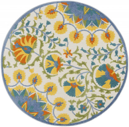 5' X 8' Ivory And Blue Floral Indoor Outdoor Area Rug