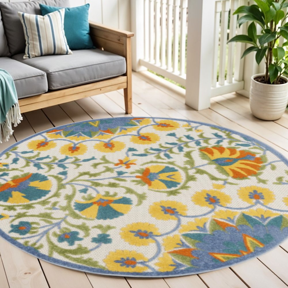 8' X 11' Ivory And Blue Floral Indoor Outdoor Area Rug