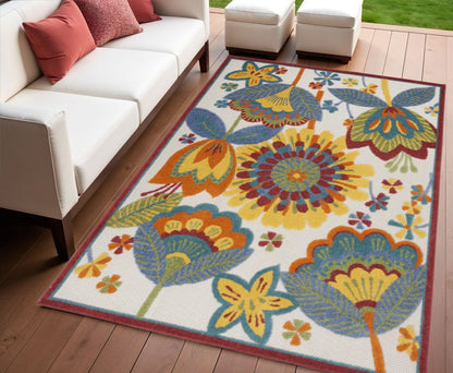 5' X 8' Yellow And Ivory Indoor Outdoor Area Rug