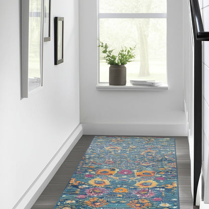 5' X 7' Blue And Orange Floral Distressed Area Rug