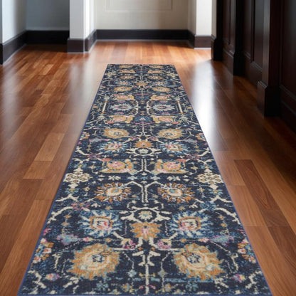 5' X 7' Navy Blue Yellow And Pink Floral Area Rug