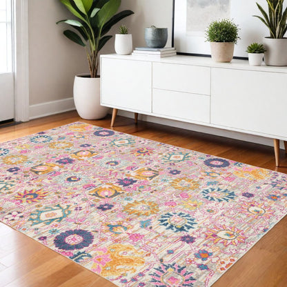 5' X 7' Gray And Pink Floral Distressed Area Rug