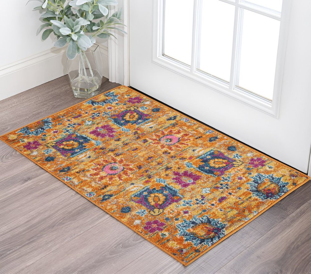 8' Blue And Orange Floral Distressed Runner Rug