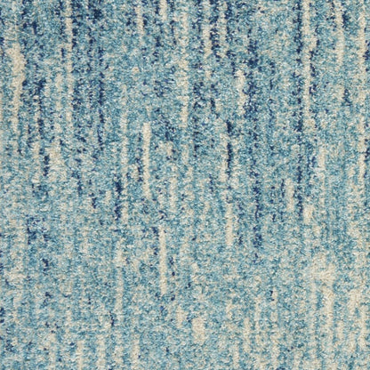 4' X 6' Blue And Ivory Abstract Area Rug