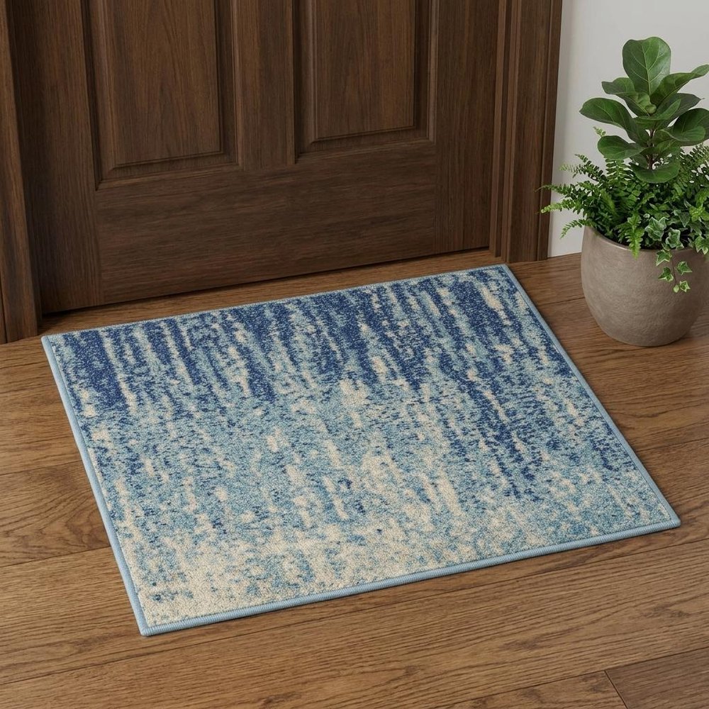 4' X 6' Blue And Ivory Abstract Area Rug