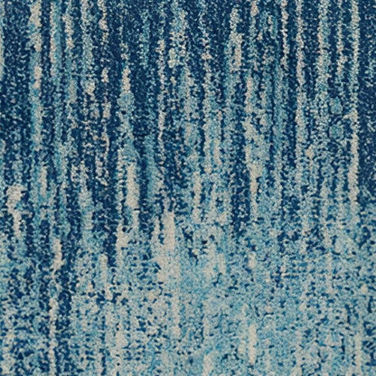 4' X 6' Blue And Ivory Abstract Area Rug